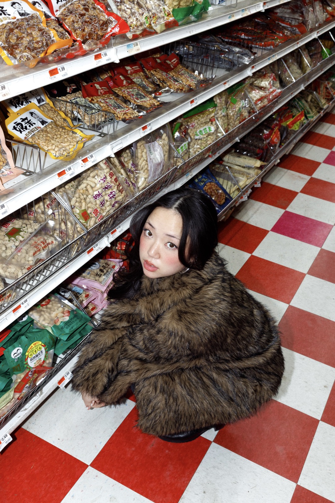 Sitting on a checkered floor