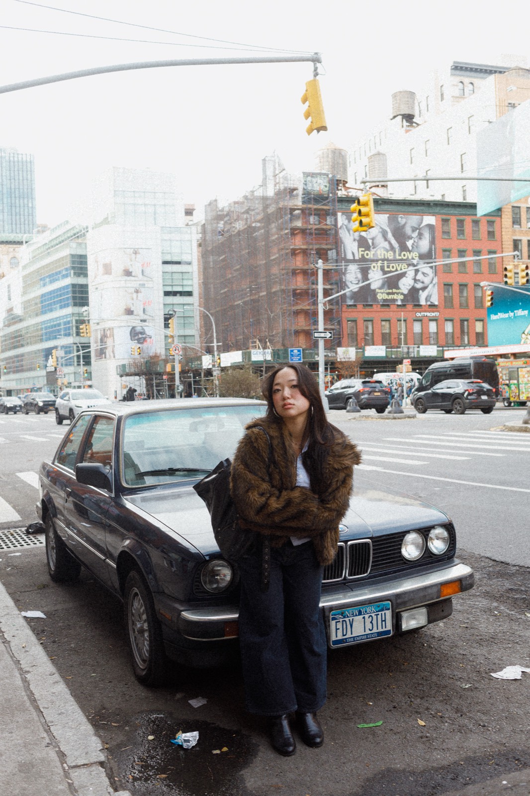 Leaning on a vintage car