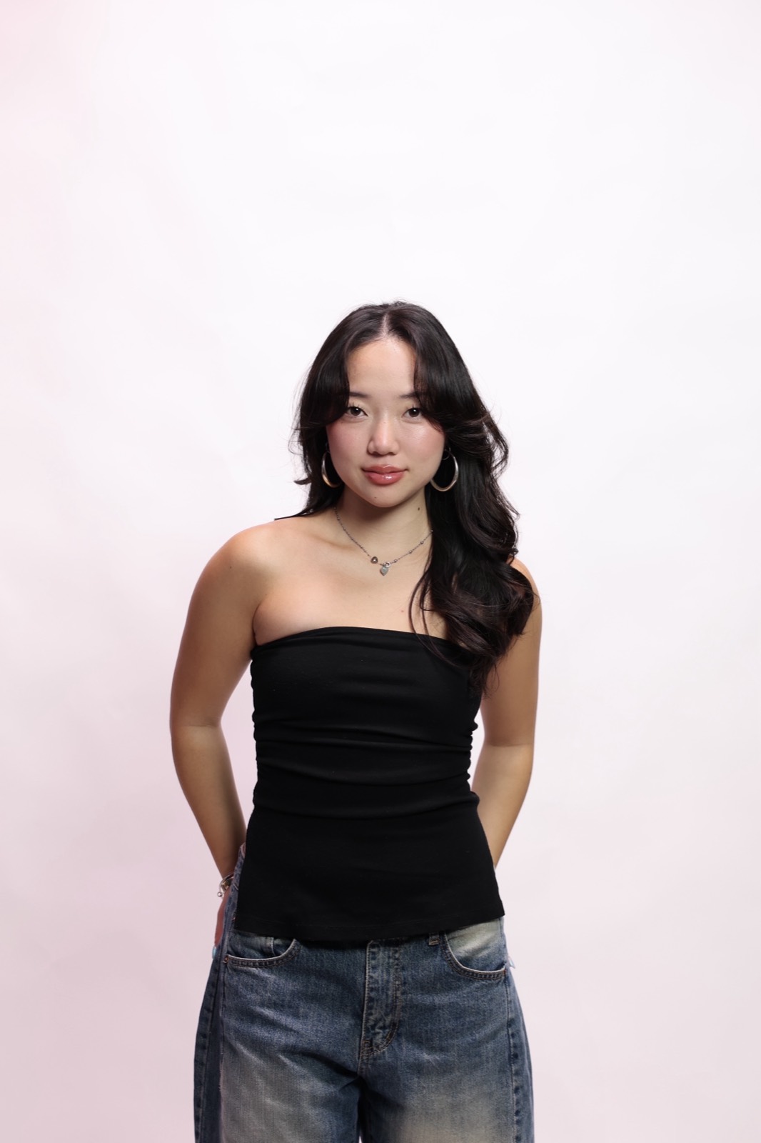 Studio portrait in a black top