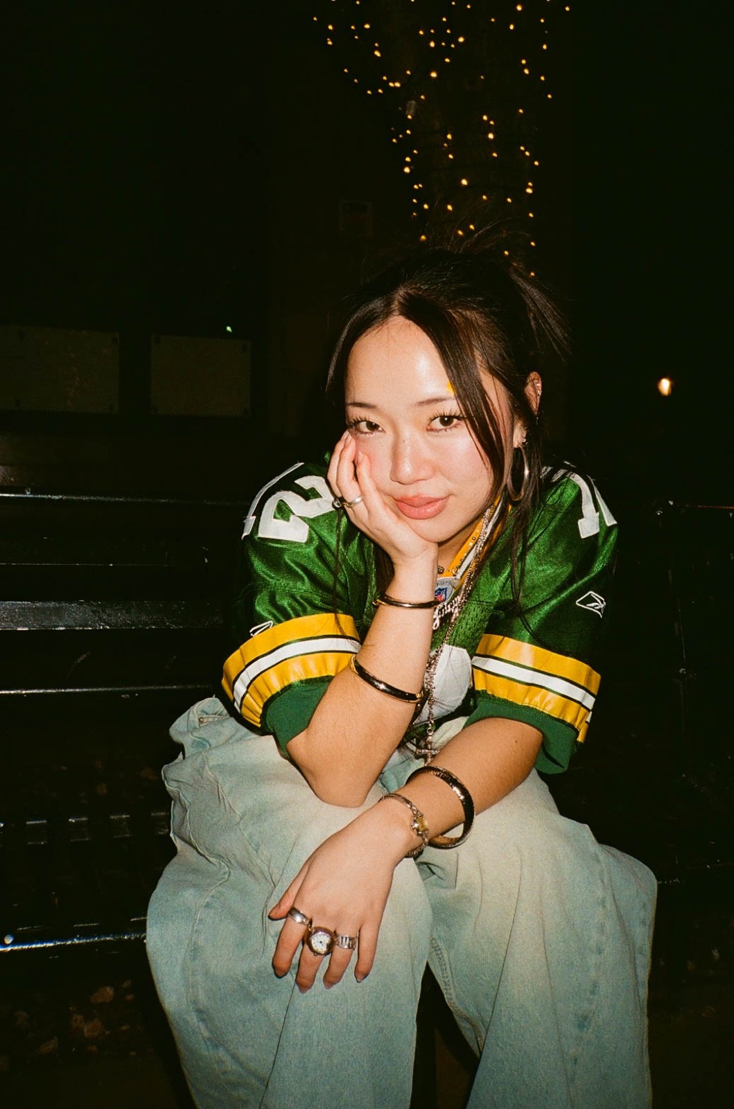 Night portrait, hand on cheek