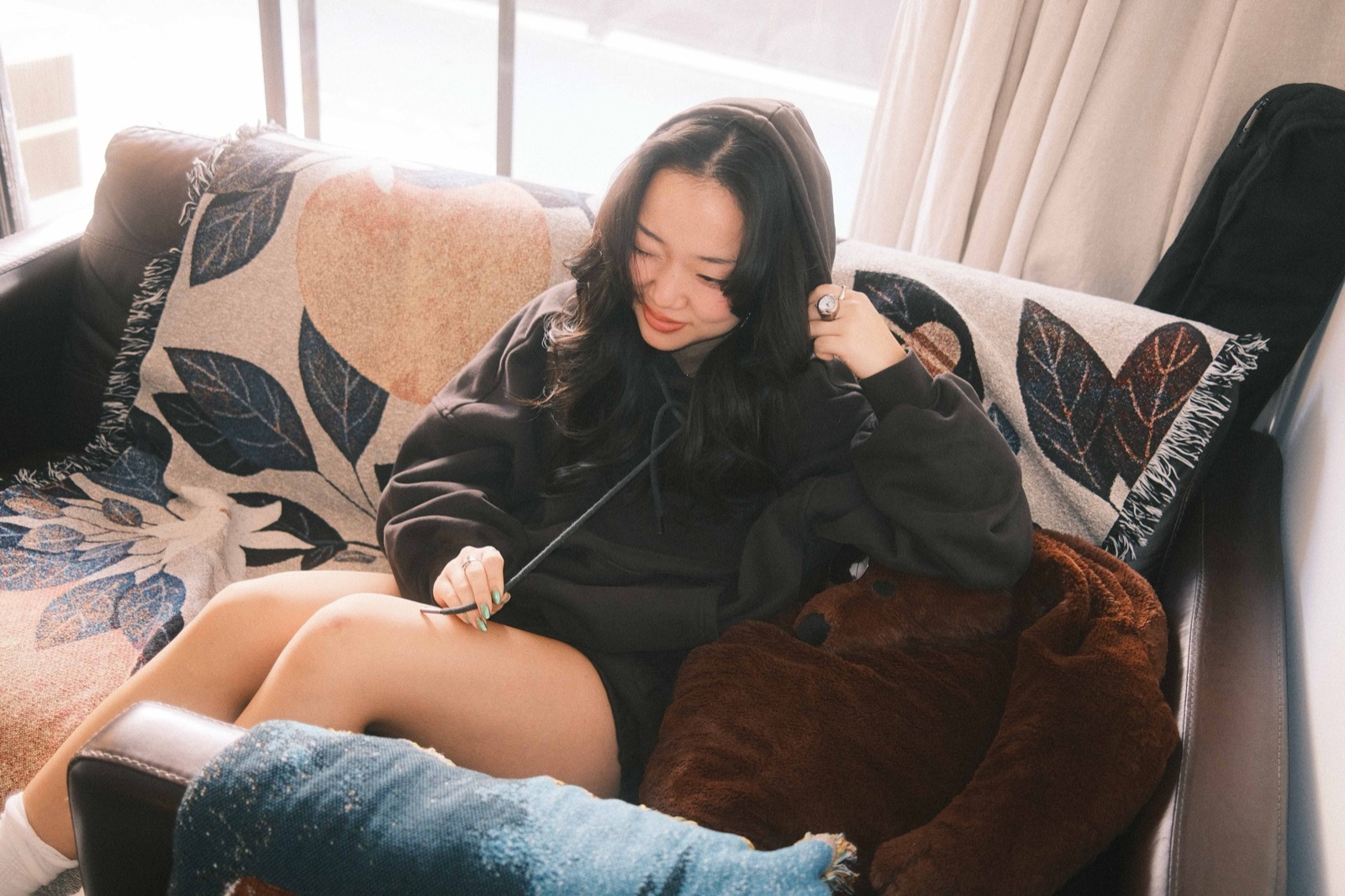 Curled on a couch